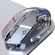 Silver gaming mouse on a reflective surface with a blurred background